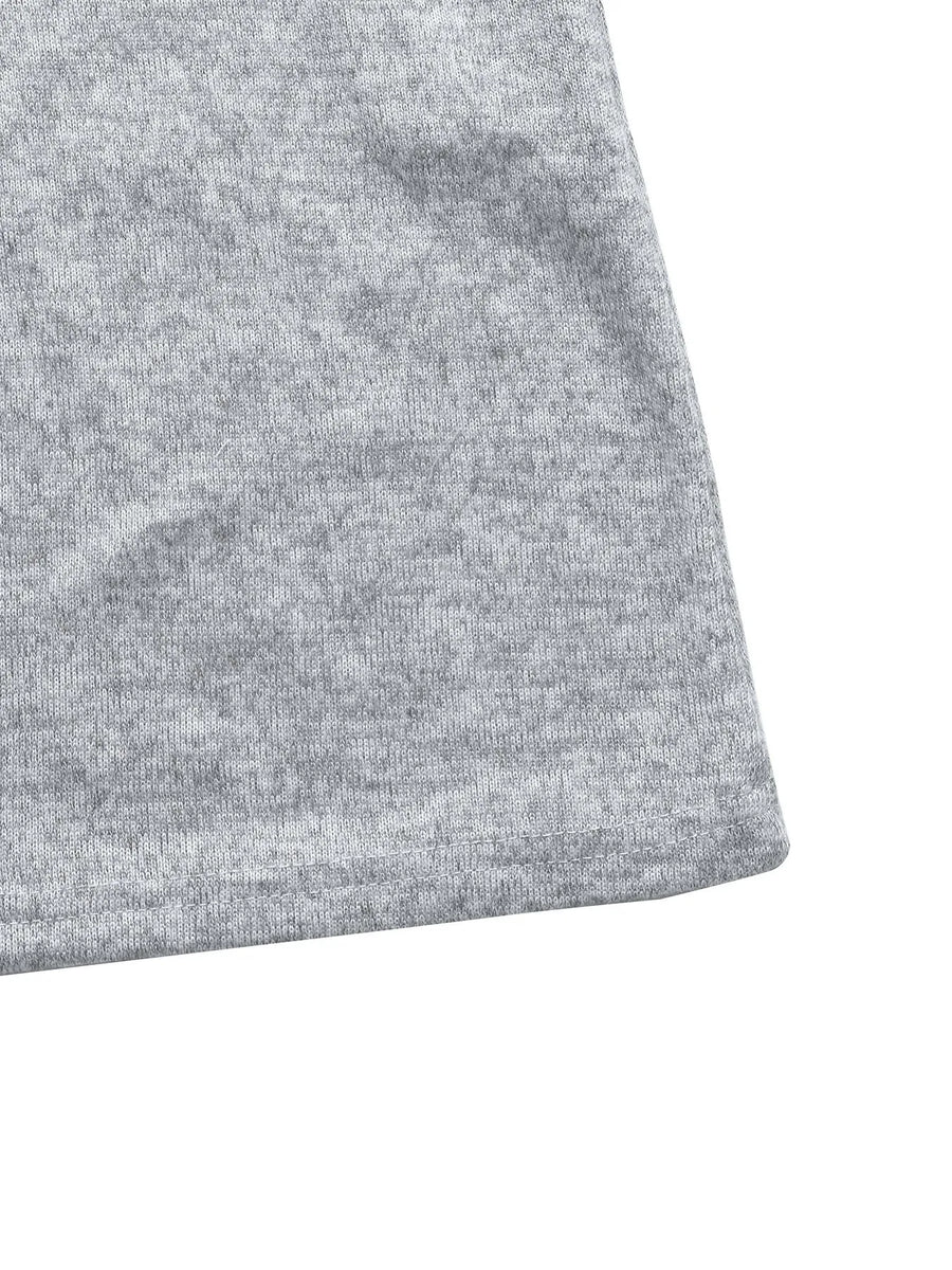Light Gray knit maxi dress detail showing hem and fabric texture.
