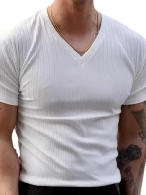 White ribbed slim-fit v-neck t-shirt with short sleeves and a gold chain necklace.