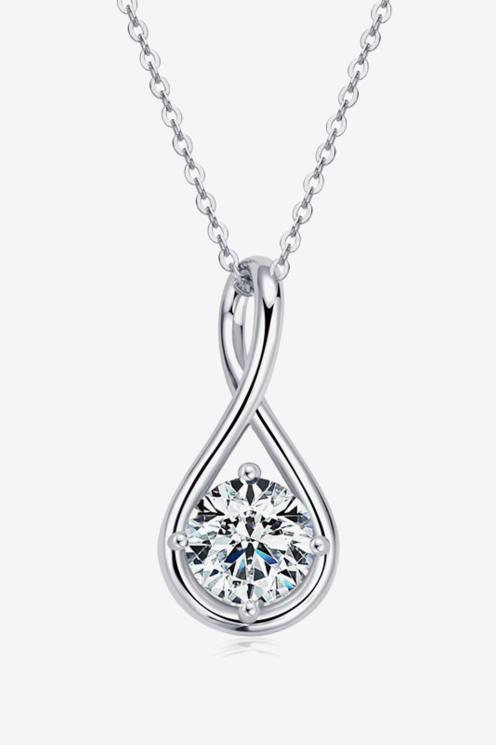Silver infinity teardrop pendant necklace with a round-cut crystal.