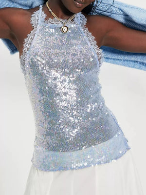Blue sequin halter cami with lace trim and a heart pendant necklace.