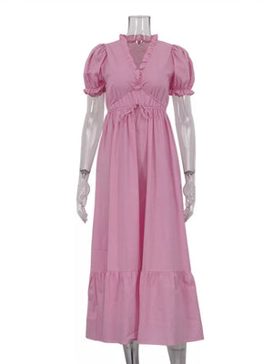 Pink midi dress with ruffled V-neck, puff sleeves, drawstring waist, and tiered hem