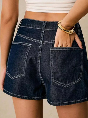 Dark blue cotton skort with contrast stitching and pocket detail.