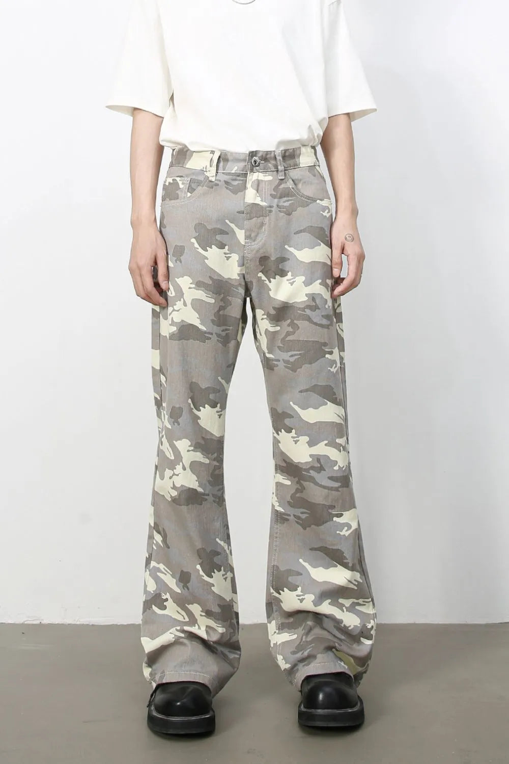 Gray camouflage denim flare trousers with a casual fit.