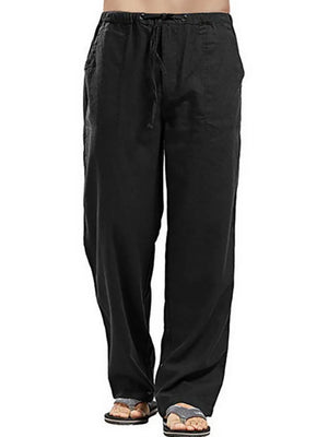 Black linen drawstring trousers with a relaxed fit and side pockets.