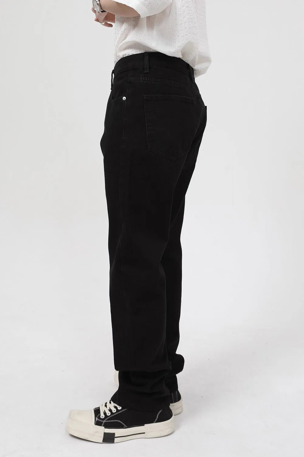 Dark relaxed fit denim jeans with zip hem detail.