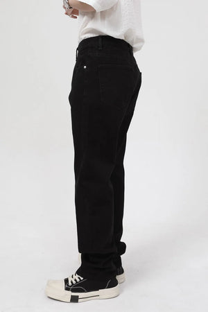 Dark relaxed fit denim jeans with zip hem detail.