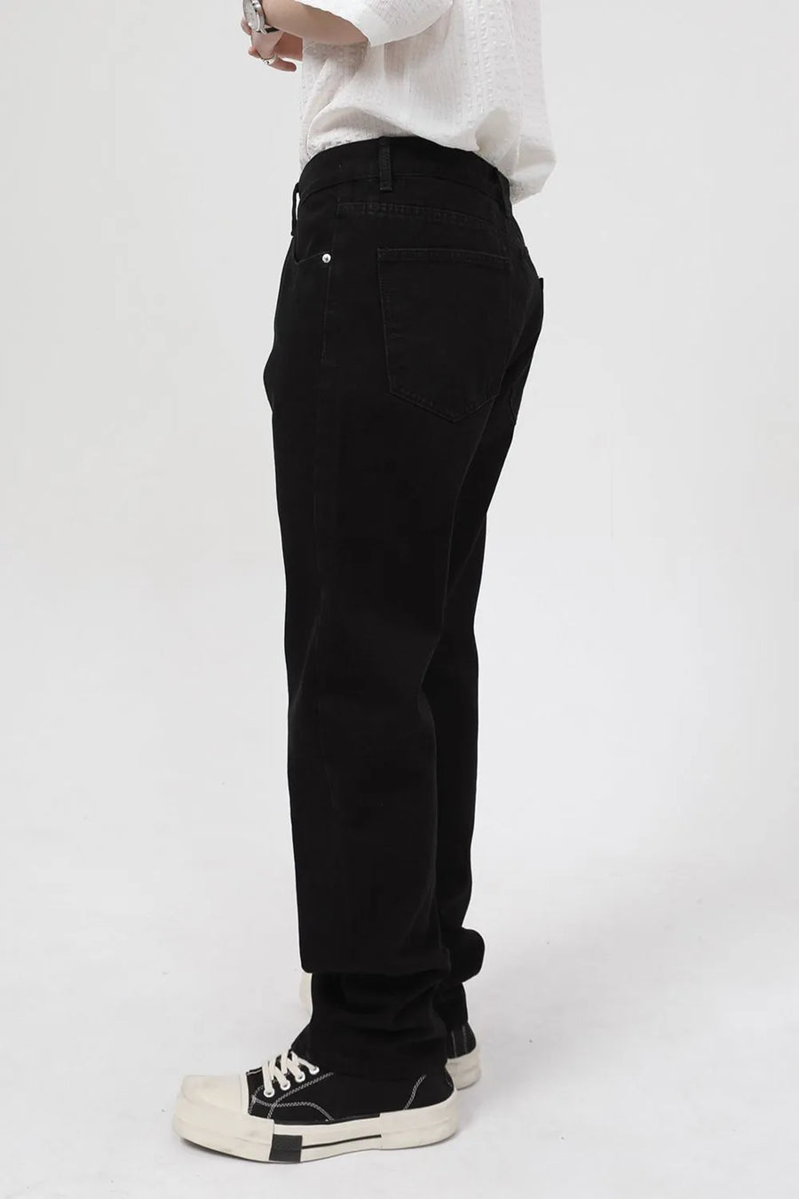 Dark relaxed fit denim jeans with zip hem detail.