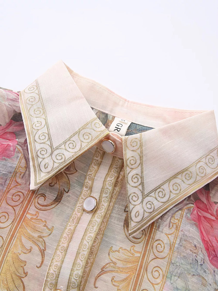 Pastel floral print button-down shirt dress with ornate collar and button details.