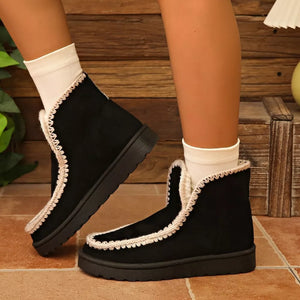 boots in black featuring crochet trim and ankle boot fit