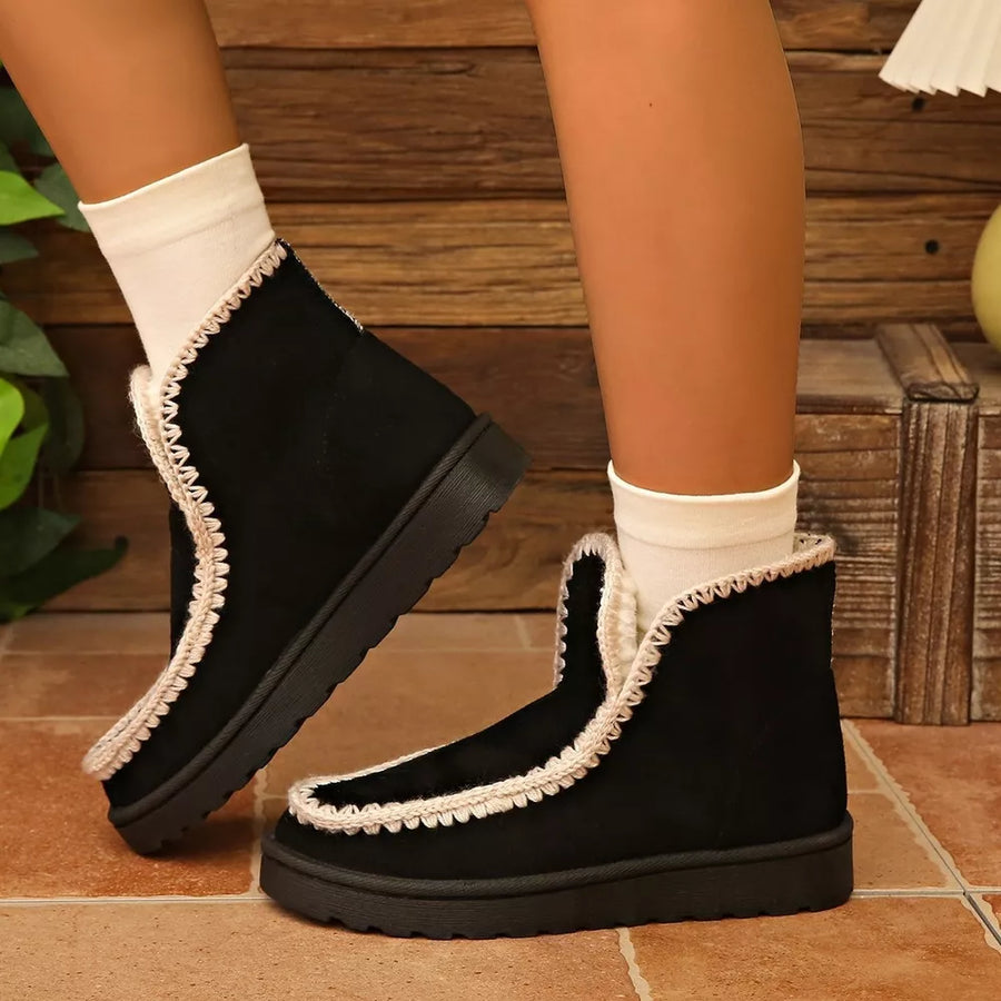 boots in black featuring crochet trim and ankle boot fit