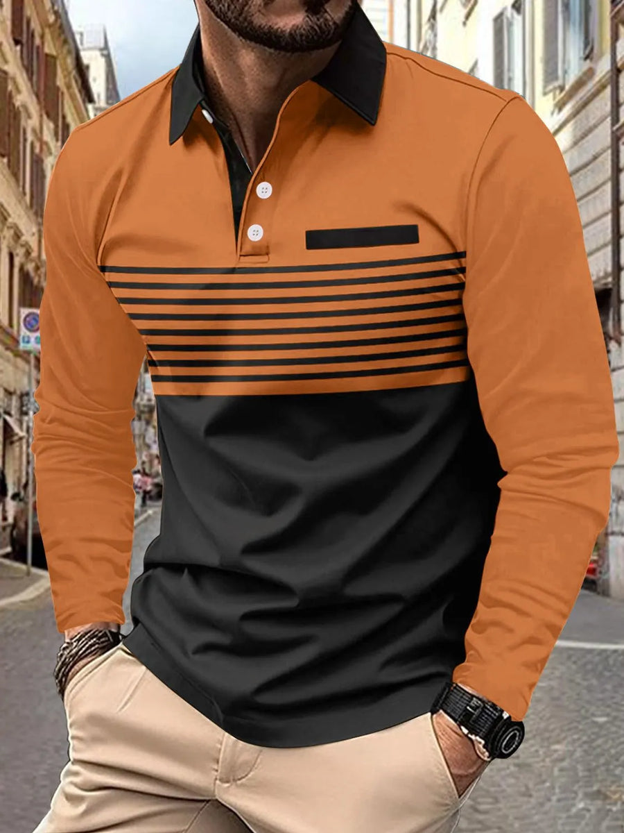 Long sleeve polo shirt in tangerine and black color block with black stripes and chest pocket.