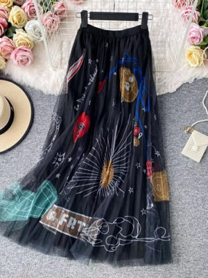 Black tulle midi skirt with whimsical sunburst and abstract print