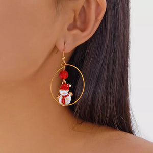 red earrings featuring snowman motif and novelty