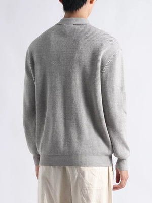 Brown pullover sweater featuring plus-size and ribbed