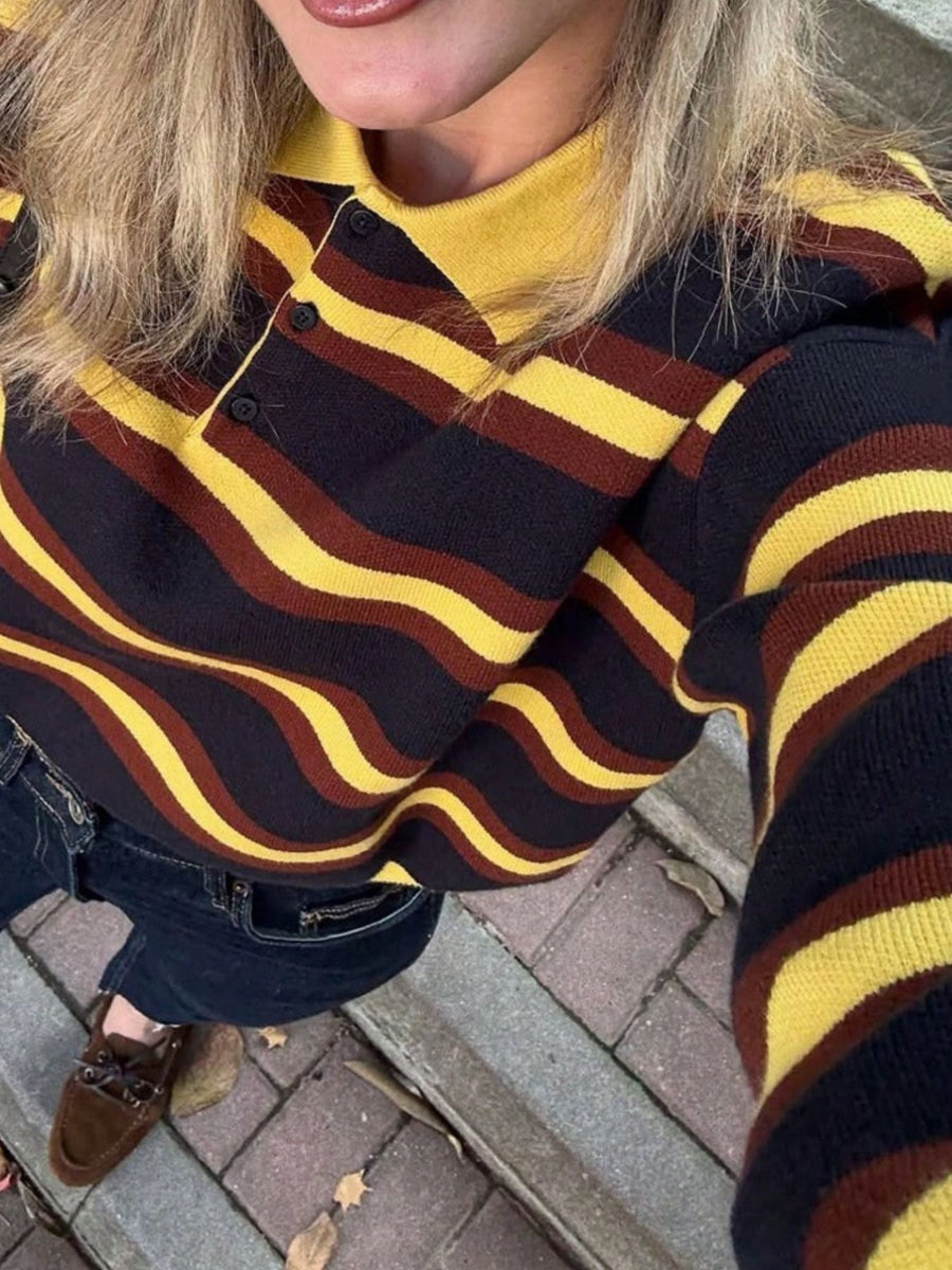 pullover sweater in black with striped and buttoned
