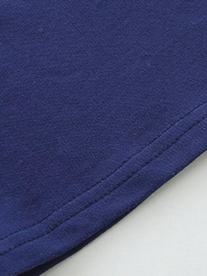 Navy blue cotton baby polo set detail with double stitching.