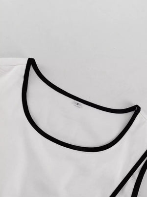 White tank top with black trim and scoop neckline