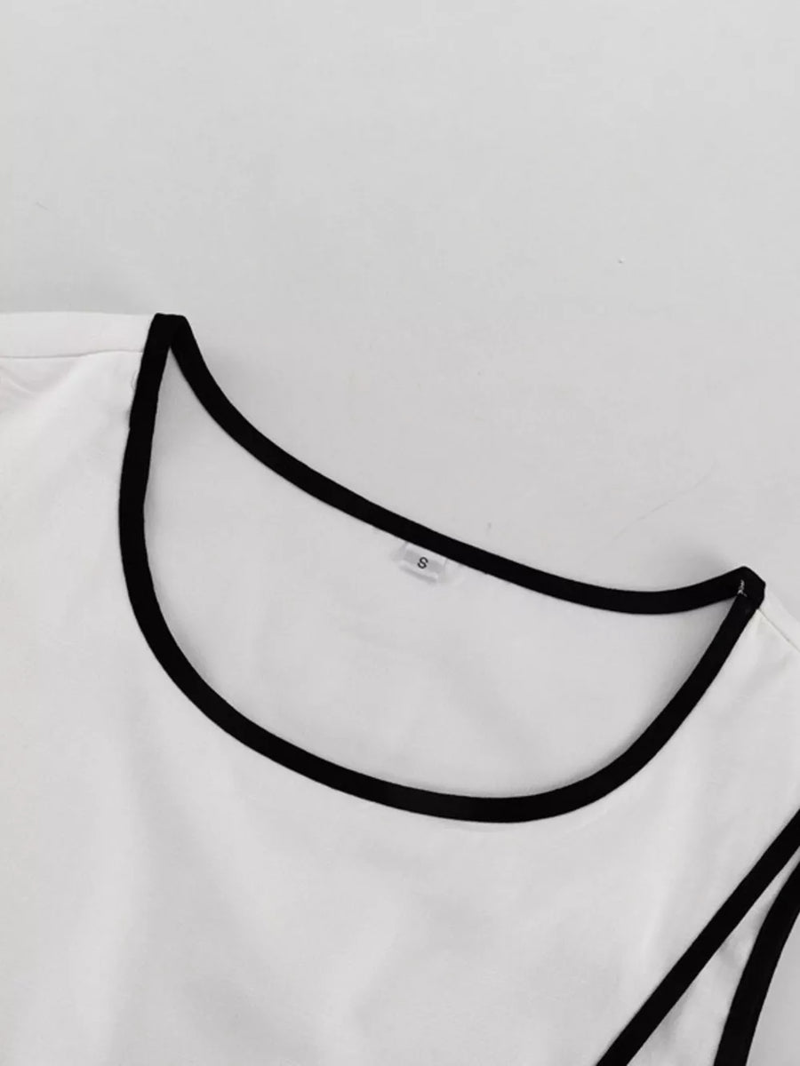 White tank top with black trim and scoop neckline