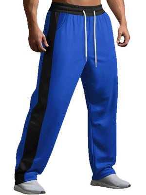 Royal blue track pants with black side panel detail and white drawstring.