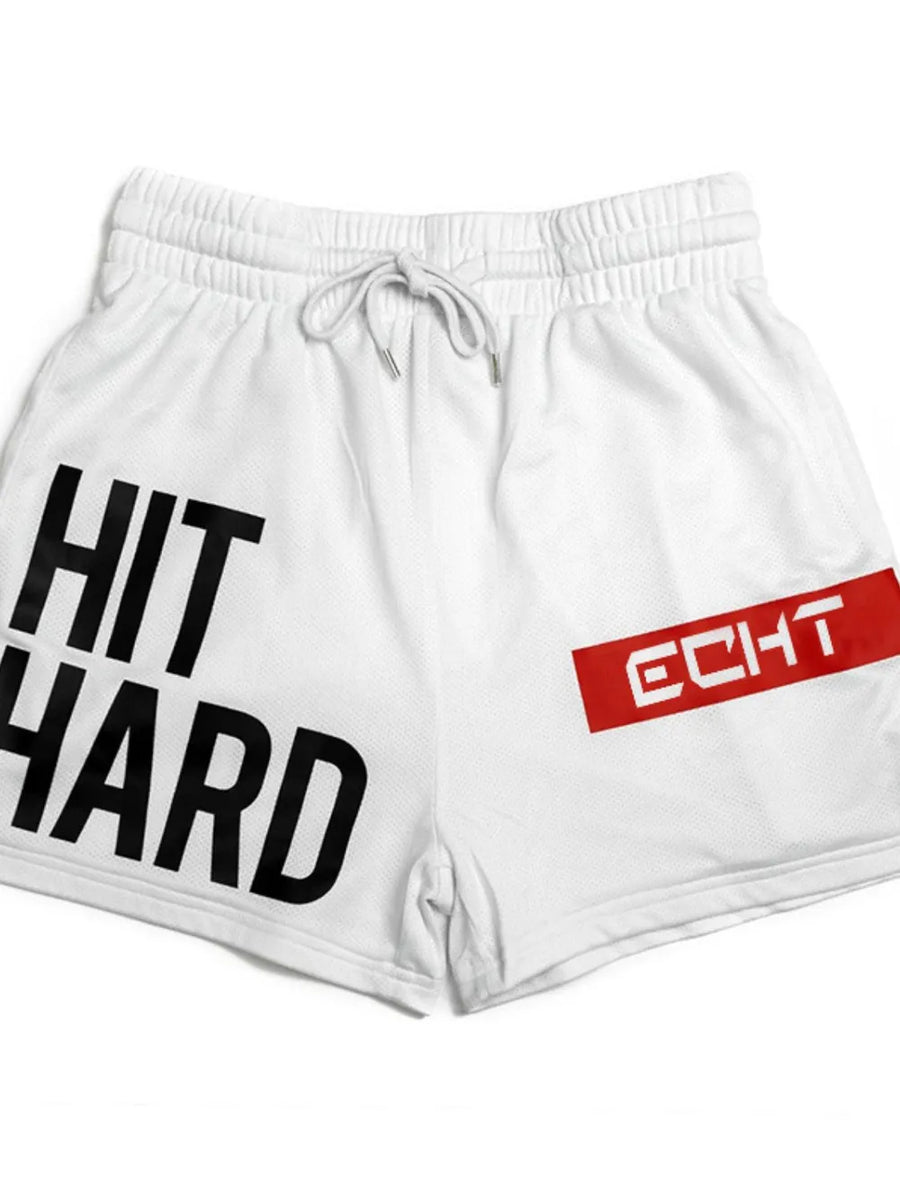 White mesh training shorts with black "HIT HARD" graphic and red "echt" logo detail.