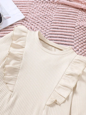 Apricot ribbed top with ruffled shoulder detail