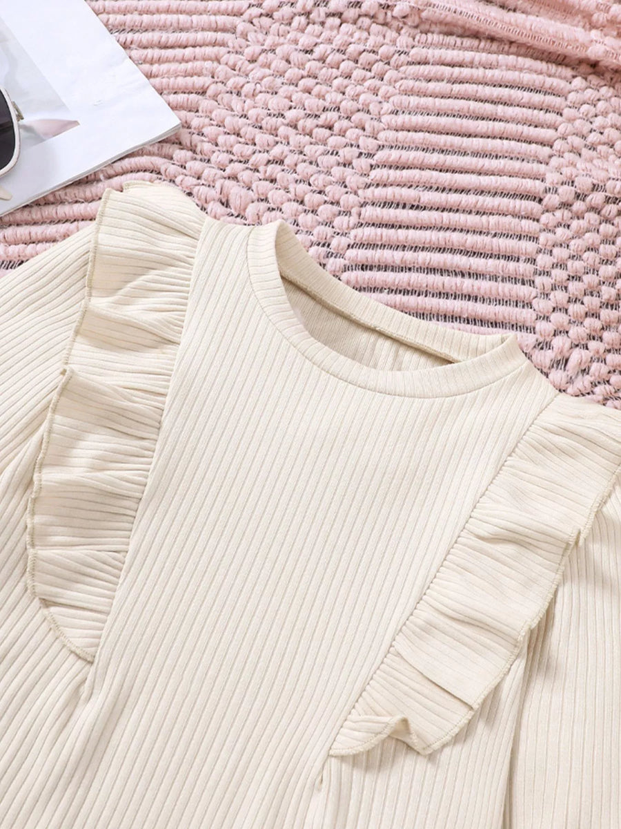 Apricot ribbed top with ruffled shoulder detail