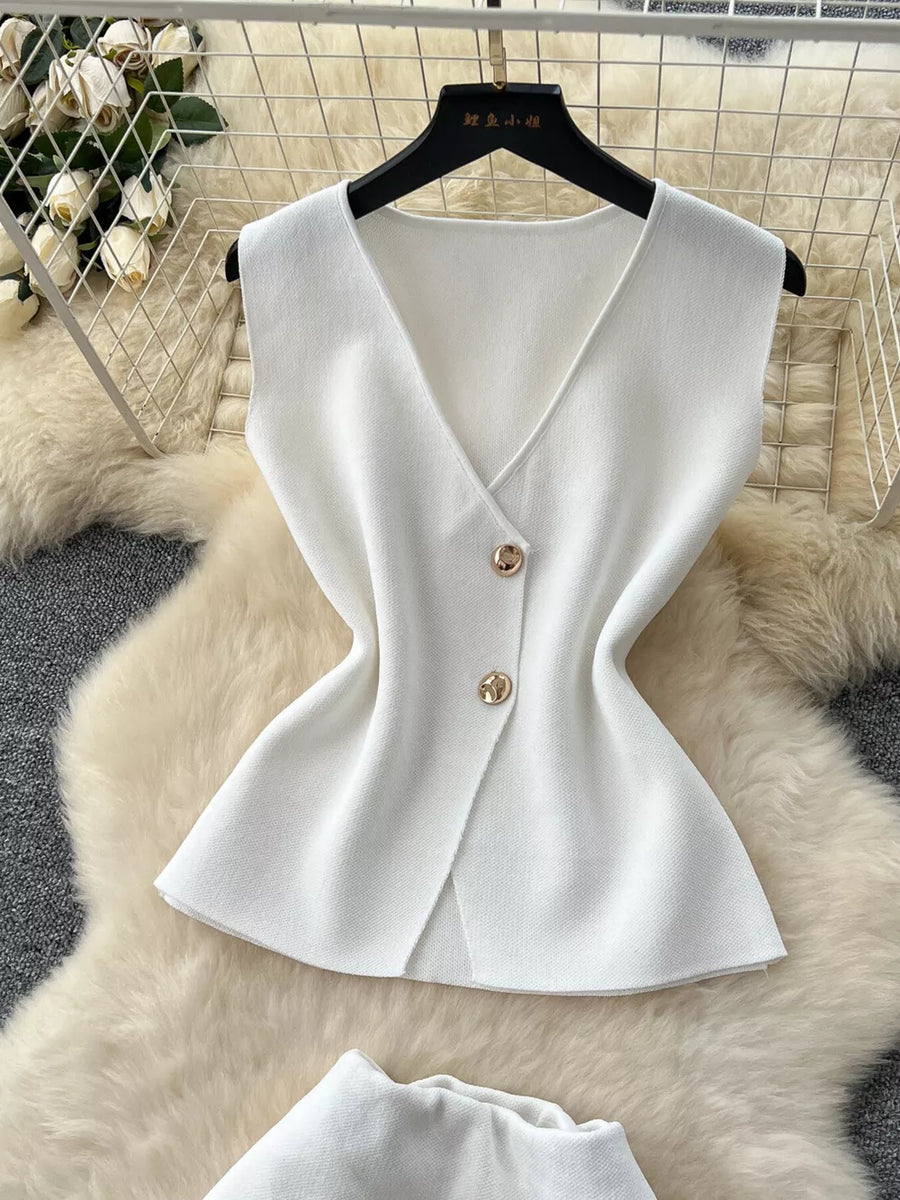 White V-neck sleeveless polyester top with button details