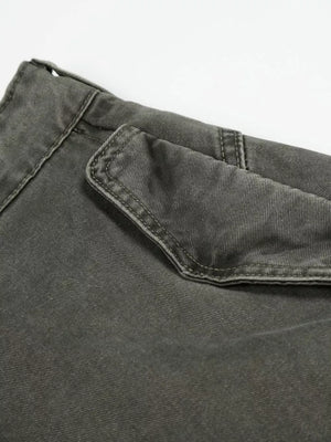Grey wide-leg cargo pants with a visible flap pocket detail.