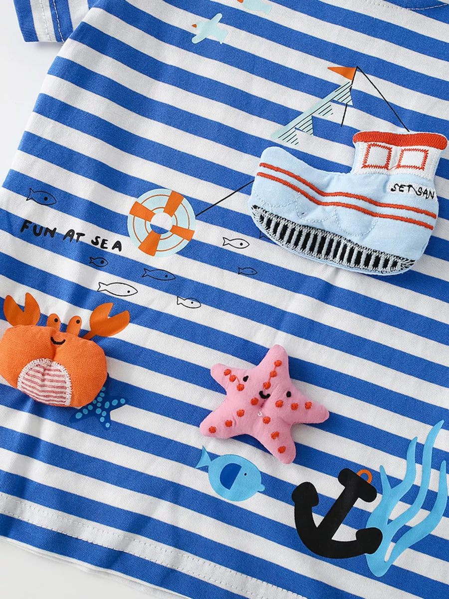 Children's blue and white striped short sleeve tee with nautical applique details.