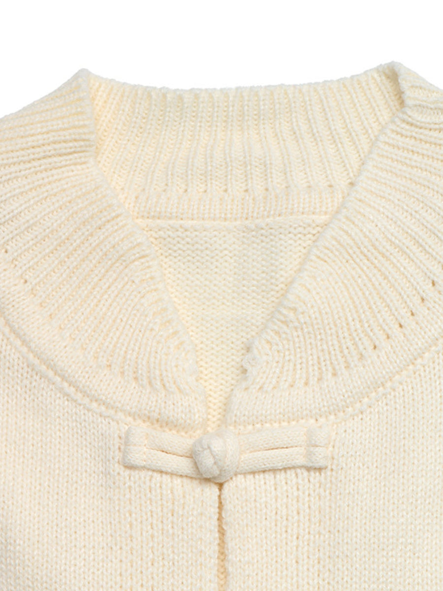 cream cardigan with contrast stripes and long sleeve