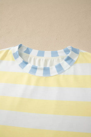 Striped t-shirt in yellow and white with a blue and white striped crew neck.