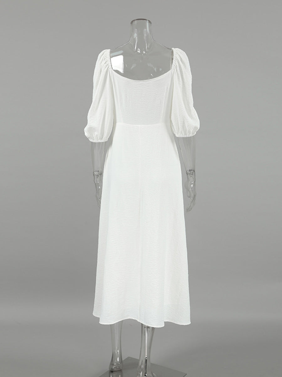 White midi dress with puff sleeves and square neckline, textured fabric, a-line cut