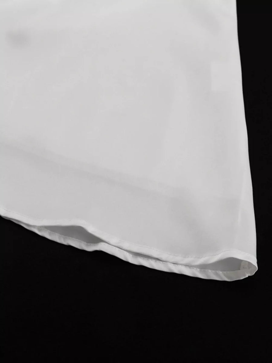 White sheer blouse with a curved hem and subtle texture.