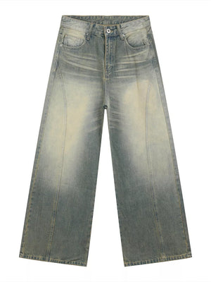 Timeless wide leg denim trousers in light blue wash with faded details and a relaxed fit.