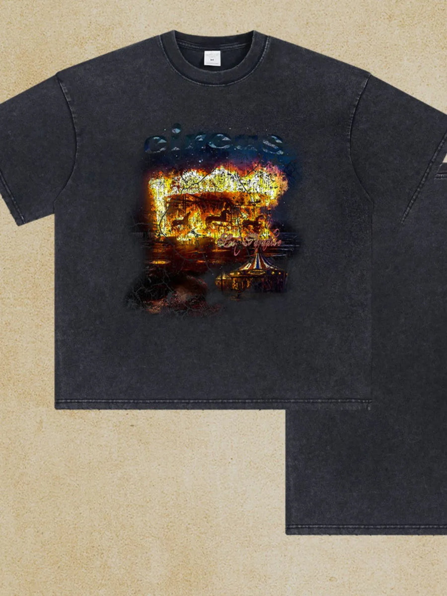 Black oversized graphic tee with vintage circus print and distressed details.