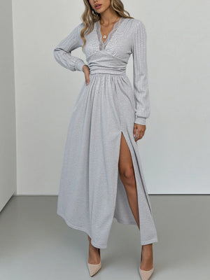 Light gray lace detail V-neck maxi dress with long sleeves and a high slit.