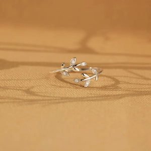 Silver branching zirconia vine ring with delicate leaf details.