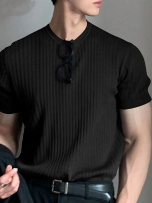 Black ribbed crewneck tee with short sleeves and a textured knit.