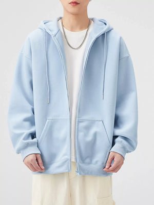 Casual loose fit zip-up hoodie in light blue with drawstring hood and front pocket.