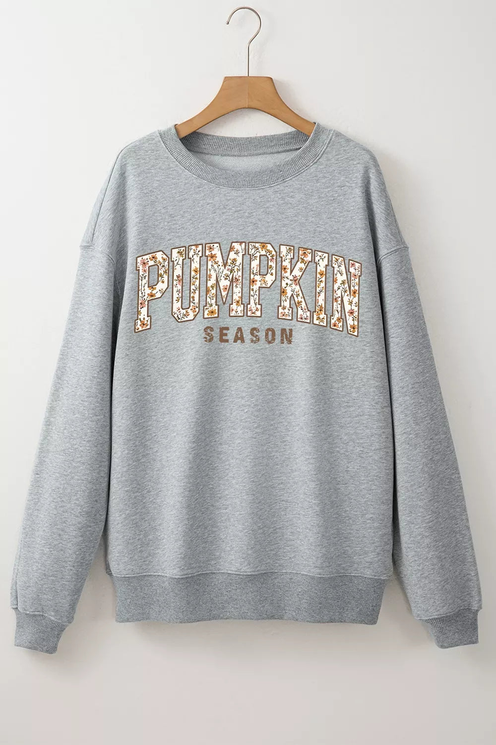 rust sweatshirt with floral print letters and long sleeve