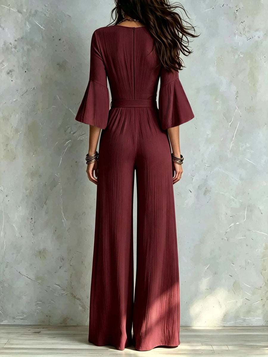 Pleated Wide-Leg Jumpsuit With Tie-Waist in Black with pocketed