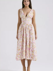 Floral print V-neck midi dress in Floral 1, with a gathered bodice and a-line skirt.
