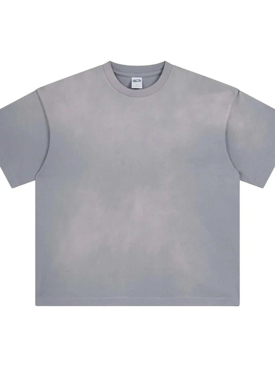 Oversized gray washed tee with relaxed fit and crewneck.