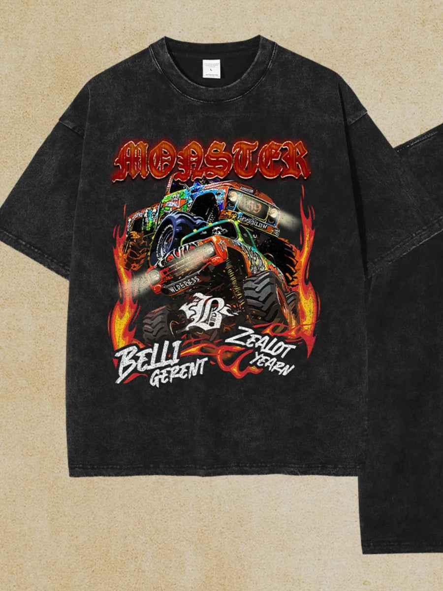 Black vintage wash graphic tee with monster trucks and flames.