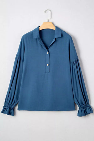 Blue collared shirt with gathered long sleeves and ruffled cuffs