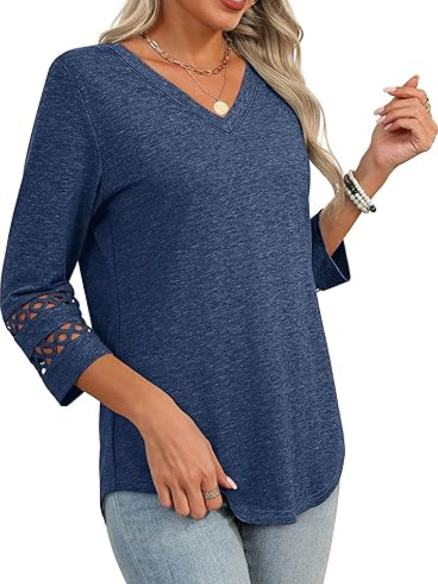 Blue V-neck t-shirt with 3/4 sleeves featuring cutout detail on the cuffs.
