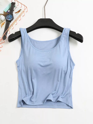 Light blue modal tank top with scoop neck and padded cups, basic style.