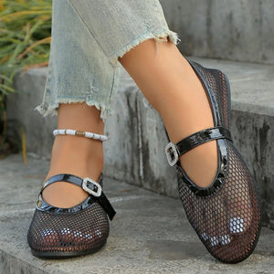 Black mesh ballet flats with patent trim and buckle detail