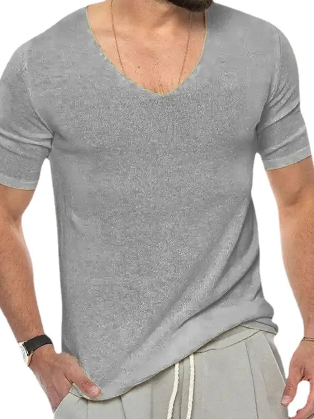 Gray textured knit tee with a subtle V-neck and short sleeves.