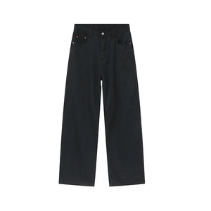 Dark oversized baggy denim trousers with wide legs and a casual fit.